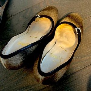 Louboutin fur heels